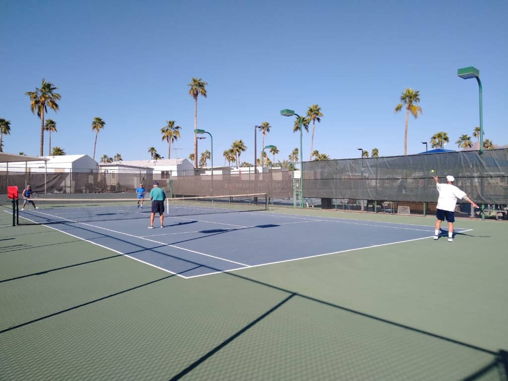 Tennis players on court