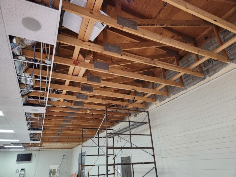 Ceiling opened to begin preventative maintenance