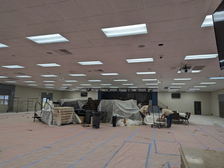 Rec Hall installation of ceiling tiles