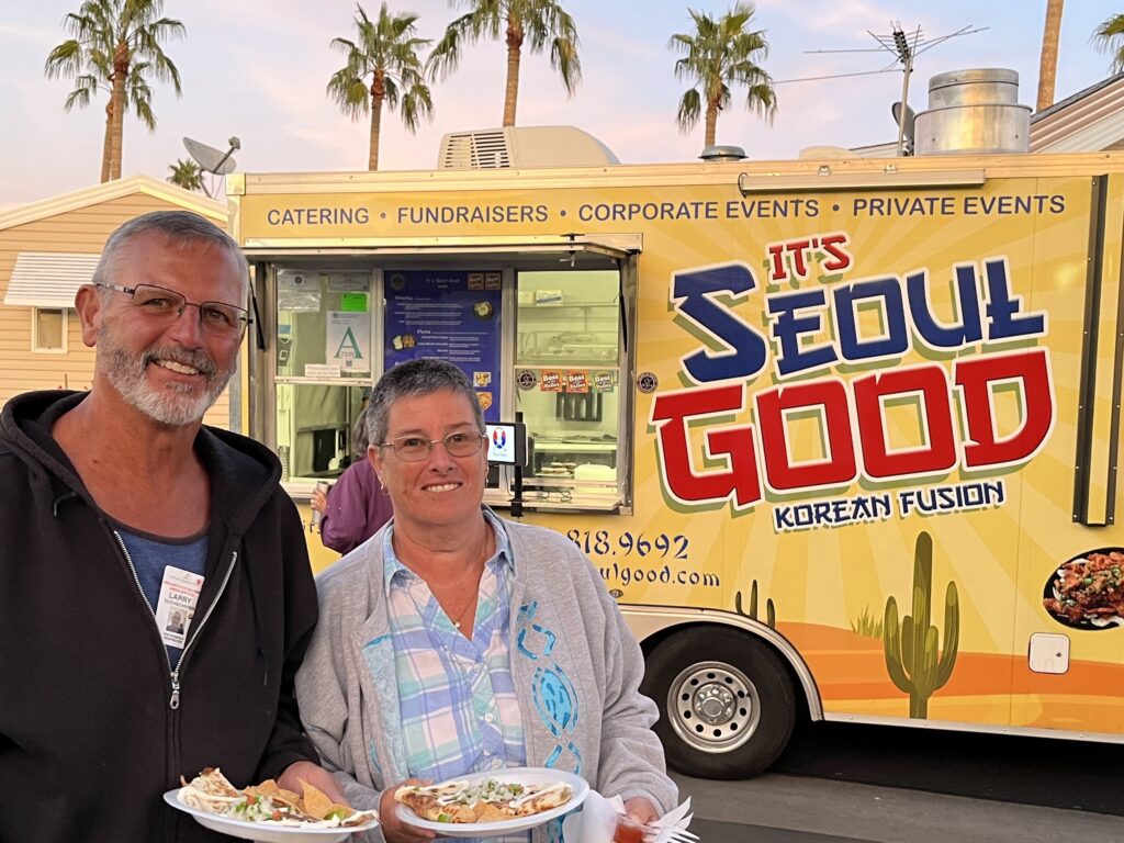 Residents in front of food truck