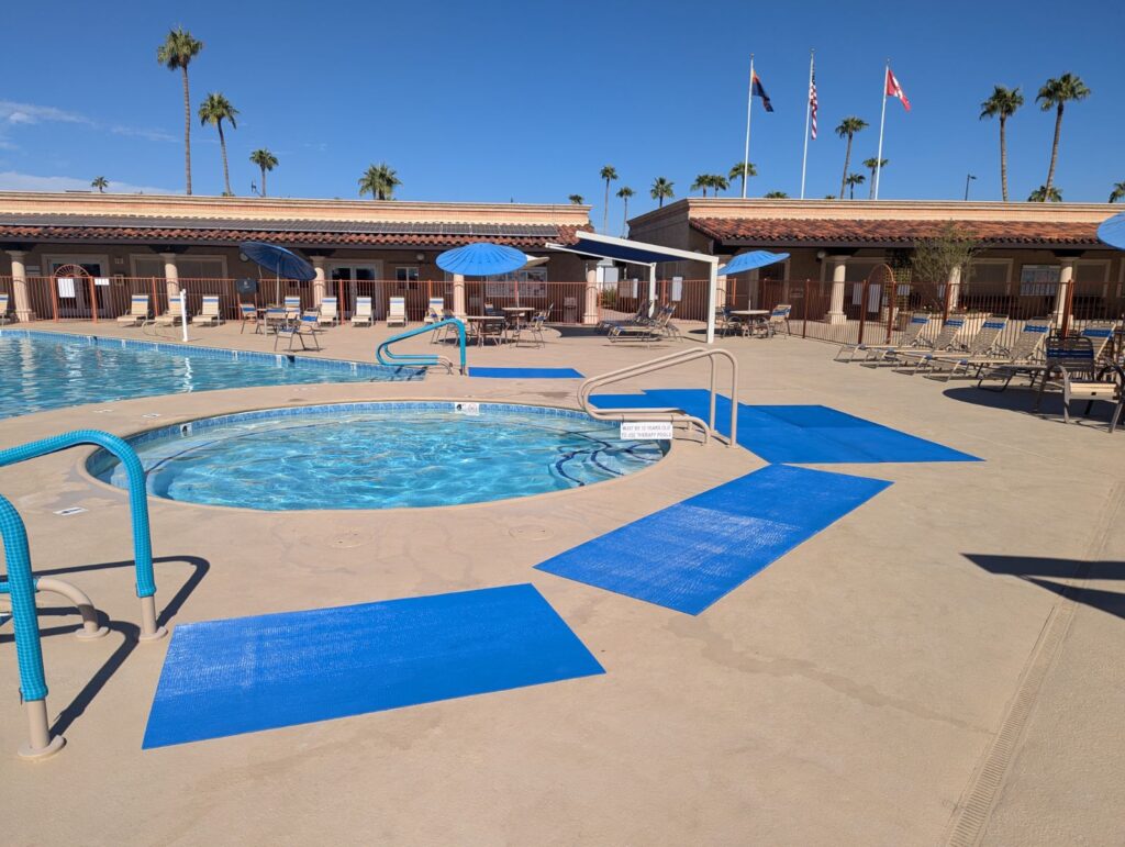 Blue mats around the Phase 1 Pool