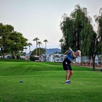 Man golfing at Roadhaven